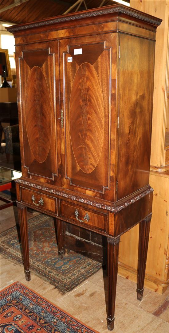 Inlaid mahogany cabinet with drawers below(-)